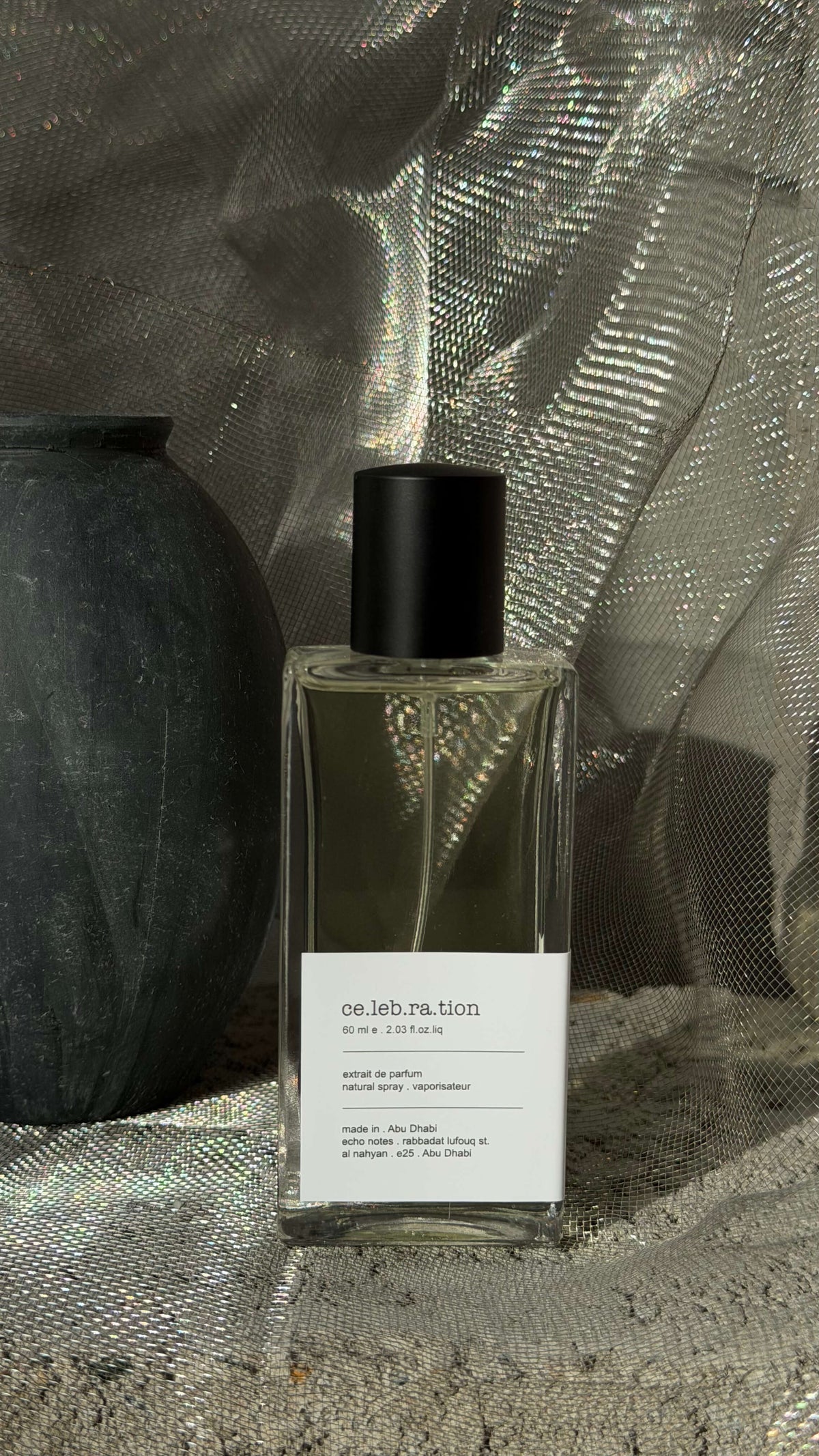 celebration eau de parfum bottle Echo Notes oud fragrance