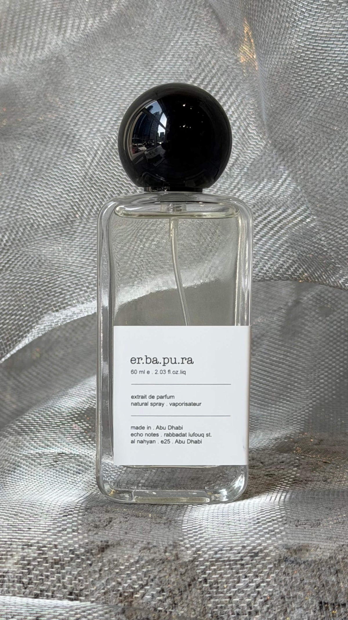 Erba Pura eau de parfum bottle — Echo Notes oriental fragrance