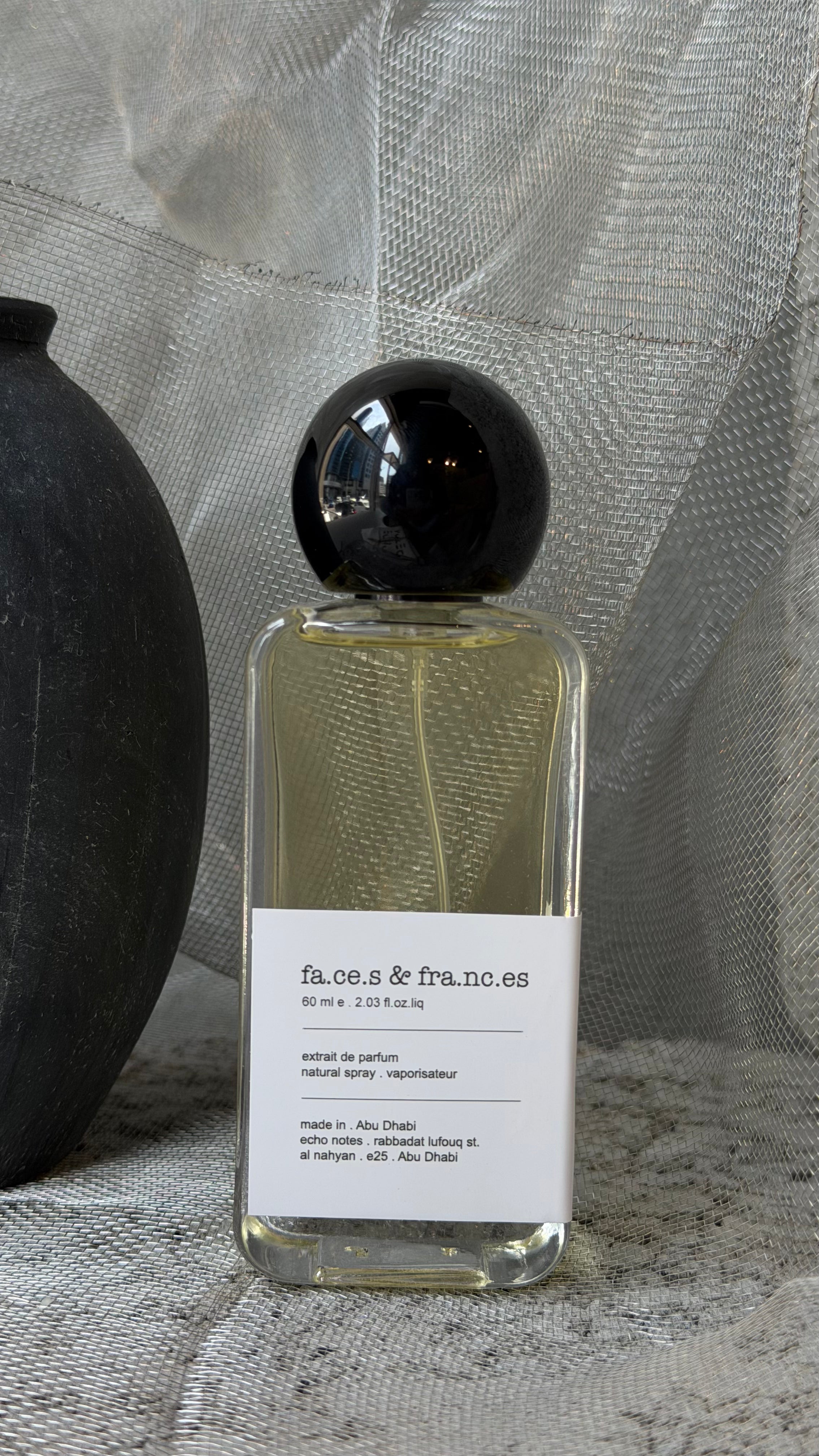 Faces of Francis perfume by Echo Notes Laboratory Perfumes, close up detail