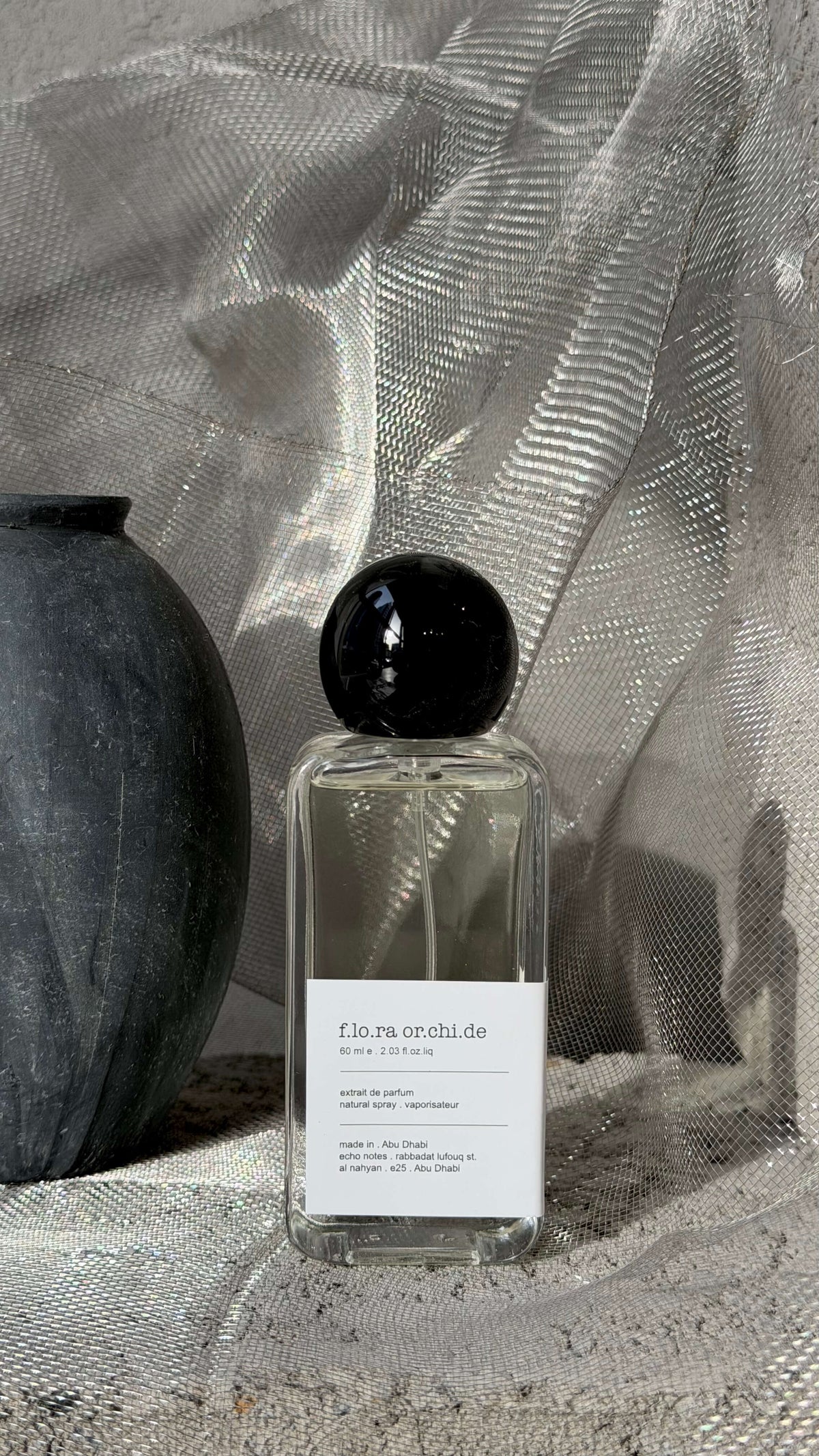 Flora Gorgeous Orchid eau de parfum bottle Echo Notes vanilla floral fragrance