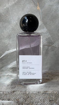 Gris eau de parfum bottle Echo Notes floral woody fragrance