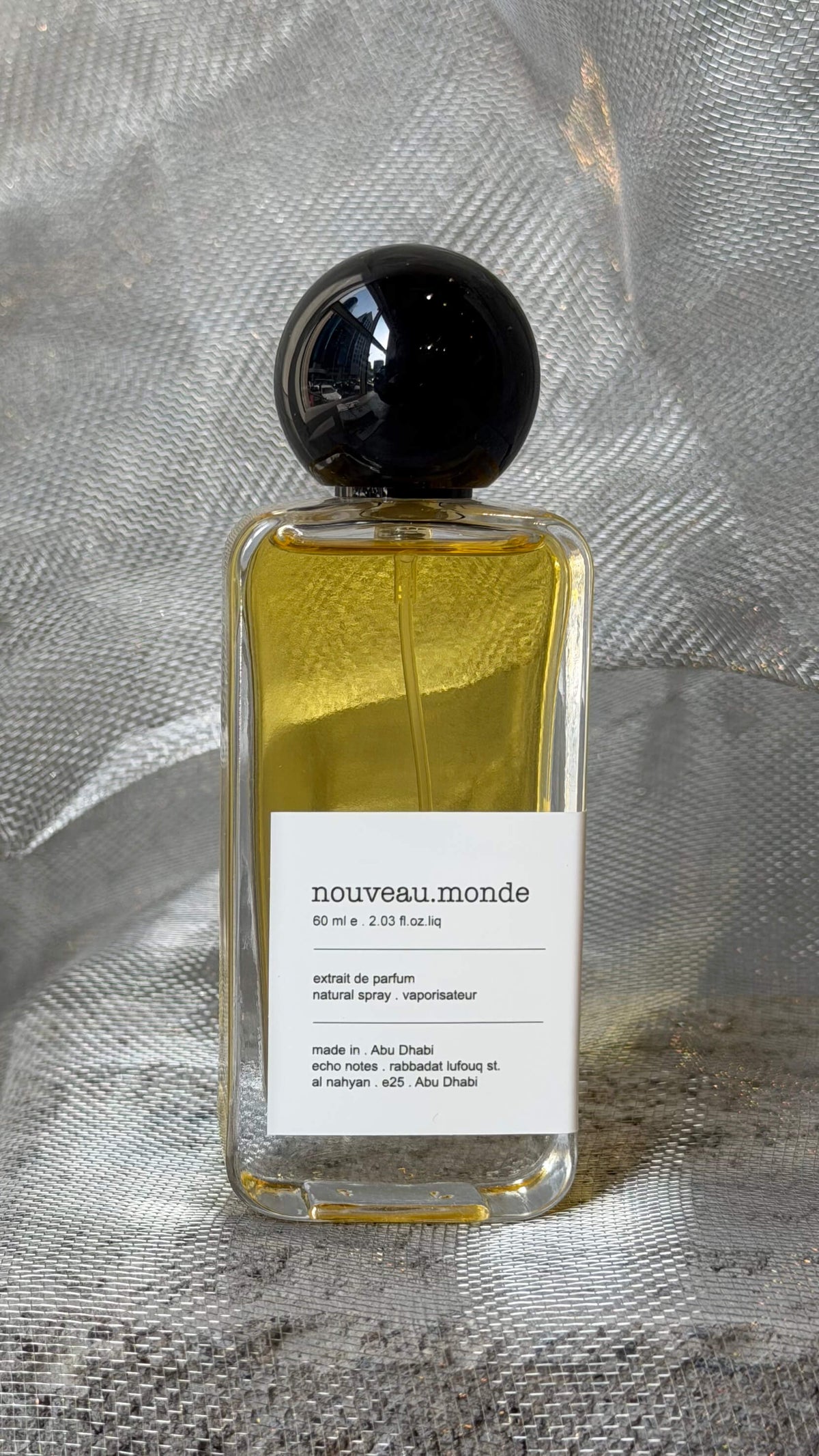 Nouveau Monde eau de parfum bottle Echo Notes oriental oud fragrance