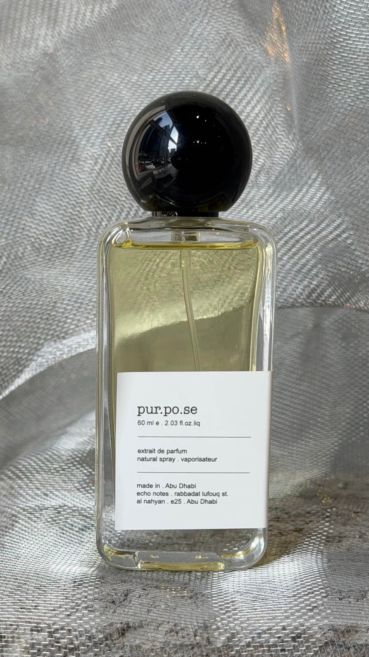 Purpose eau de parfum bottle Echo Notes oriental woody fragrance