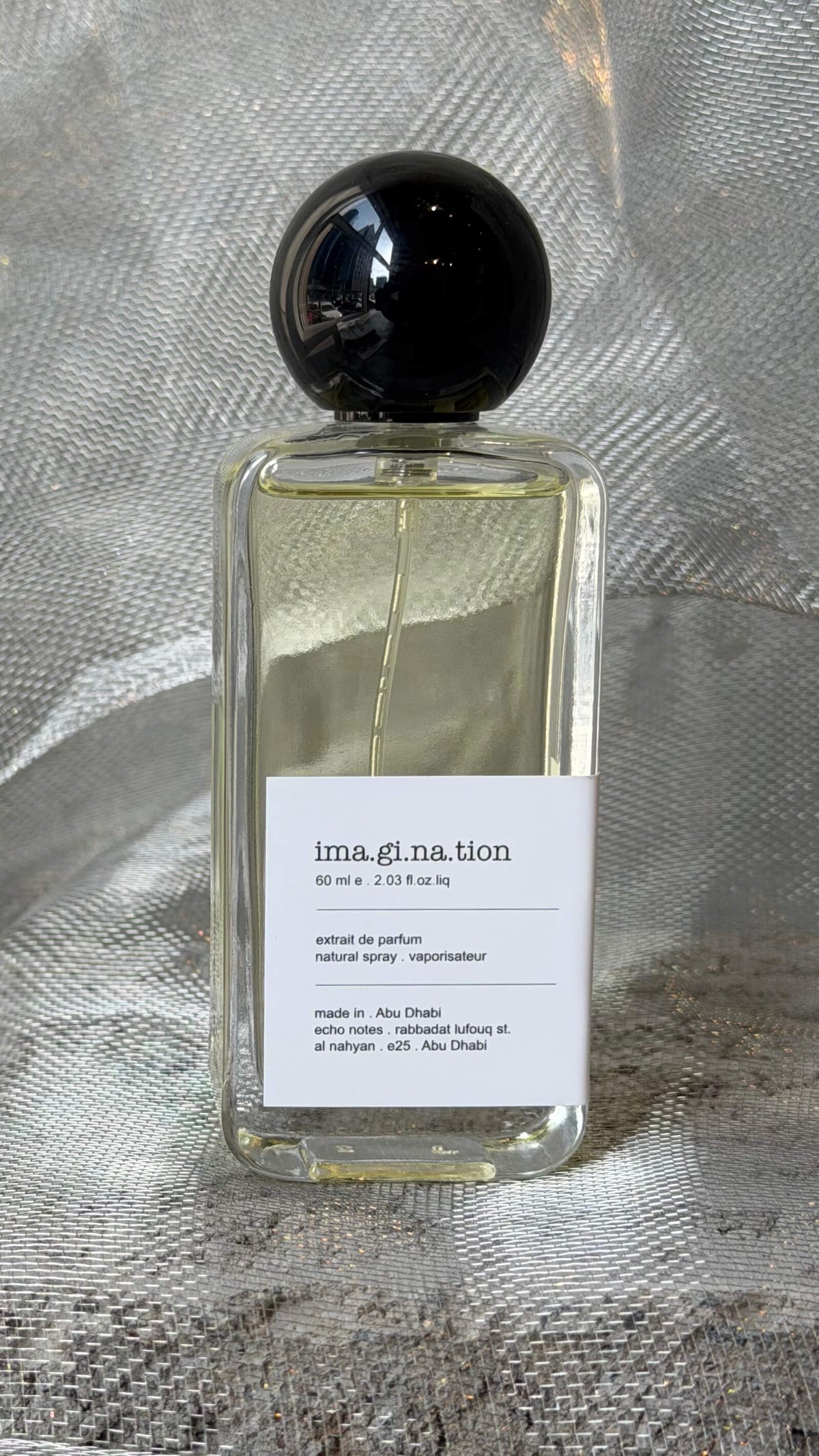 Imagination eau de parfum bottle Echo Notes citrus aromatic fragrance