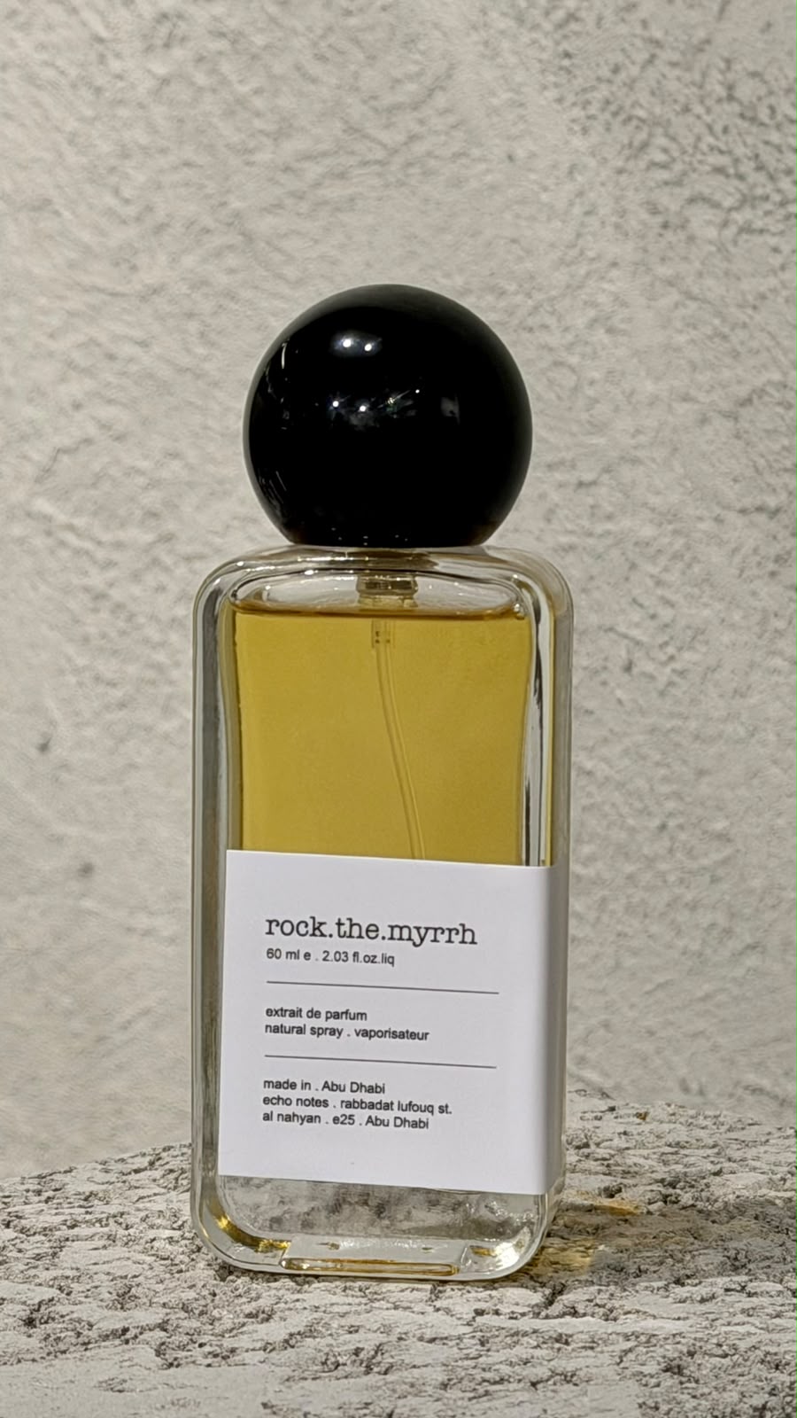 Echo Notes Rock the Myrrh perfume bottle showcasing a luxurious blend of warm myrrh, dark patchouli, and soft suede.