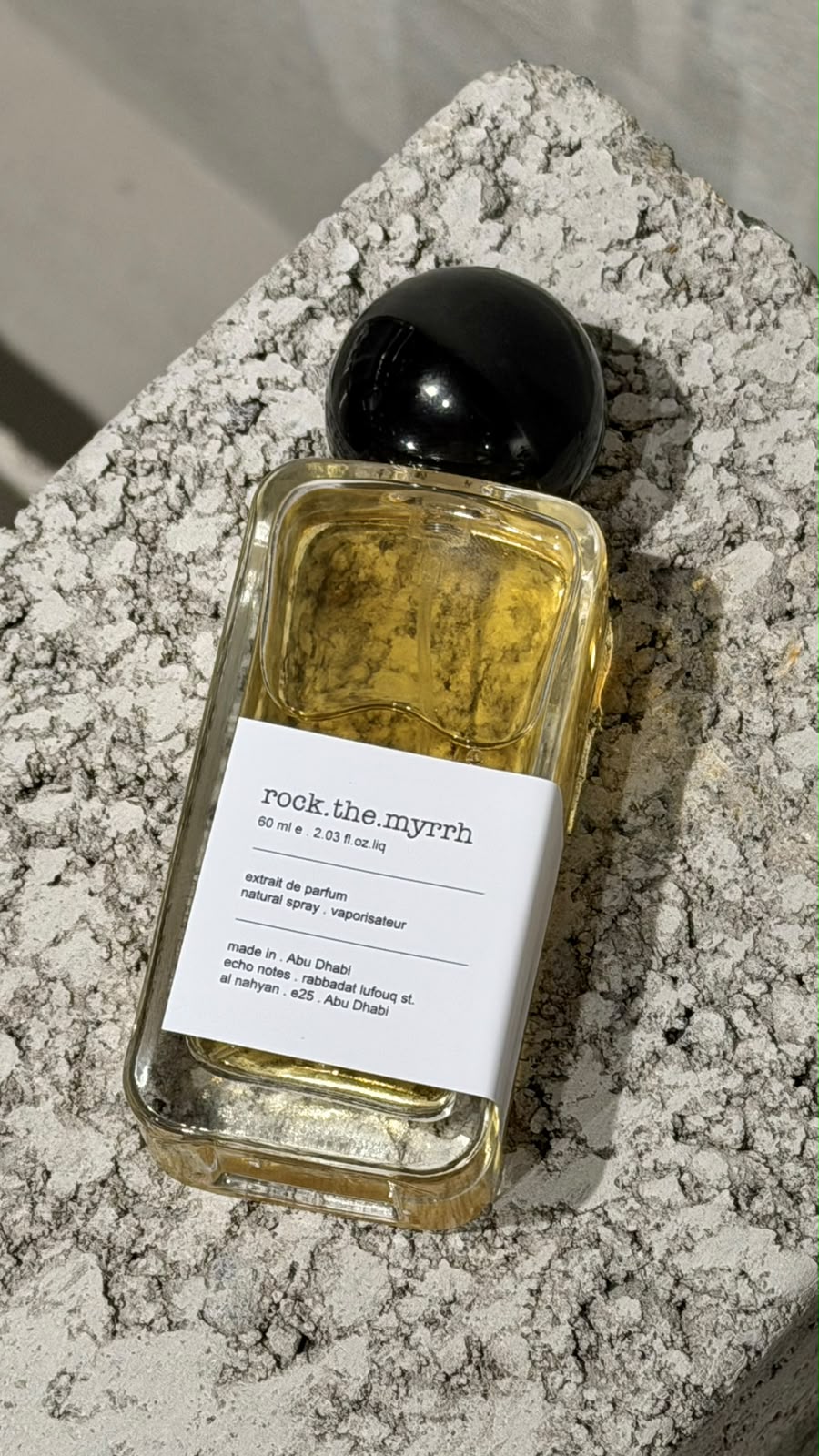 Echo Notes Rock the Myrrh perfume bottle showcasing a luxurious blend of warm myrrh, dark patchouli, and soft suede.